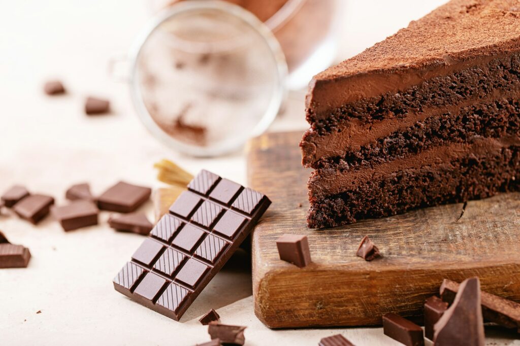 Chocolate cake served with chocolate bar