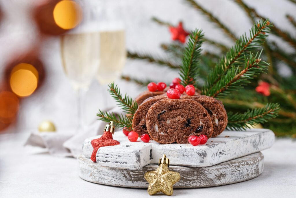 Christmas chocolate roll cake with cream