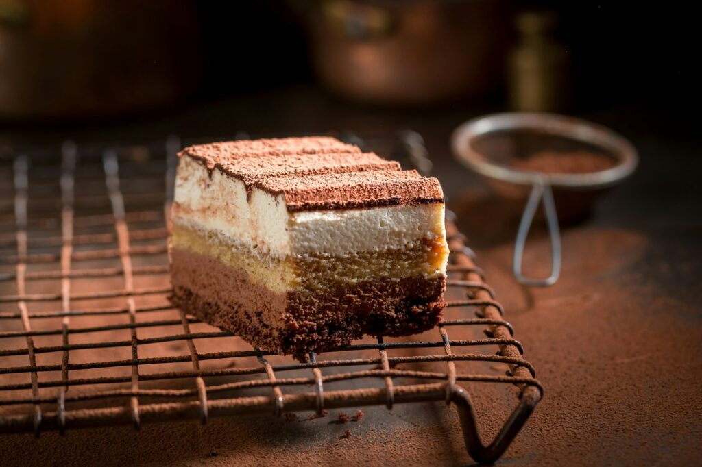 Tasty tiramisu cake with cocoa, mascarpone and biscuits